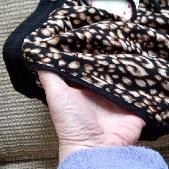 Umgee medium animal print front, solid black cheeky shorts with fringed hem. NWT - Picture 6 of 7